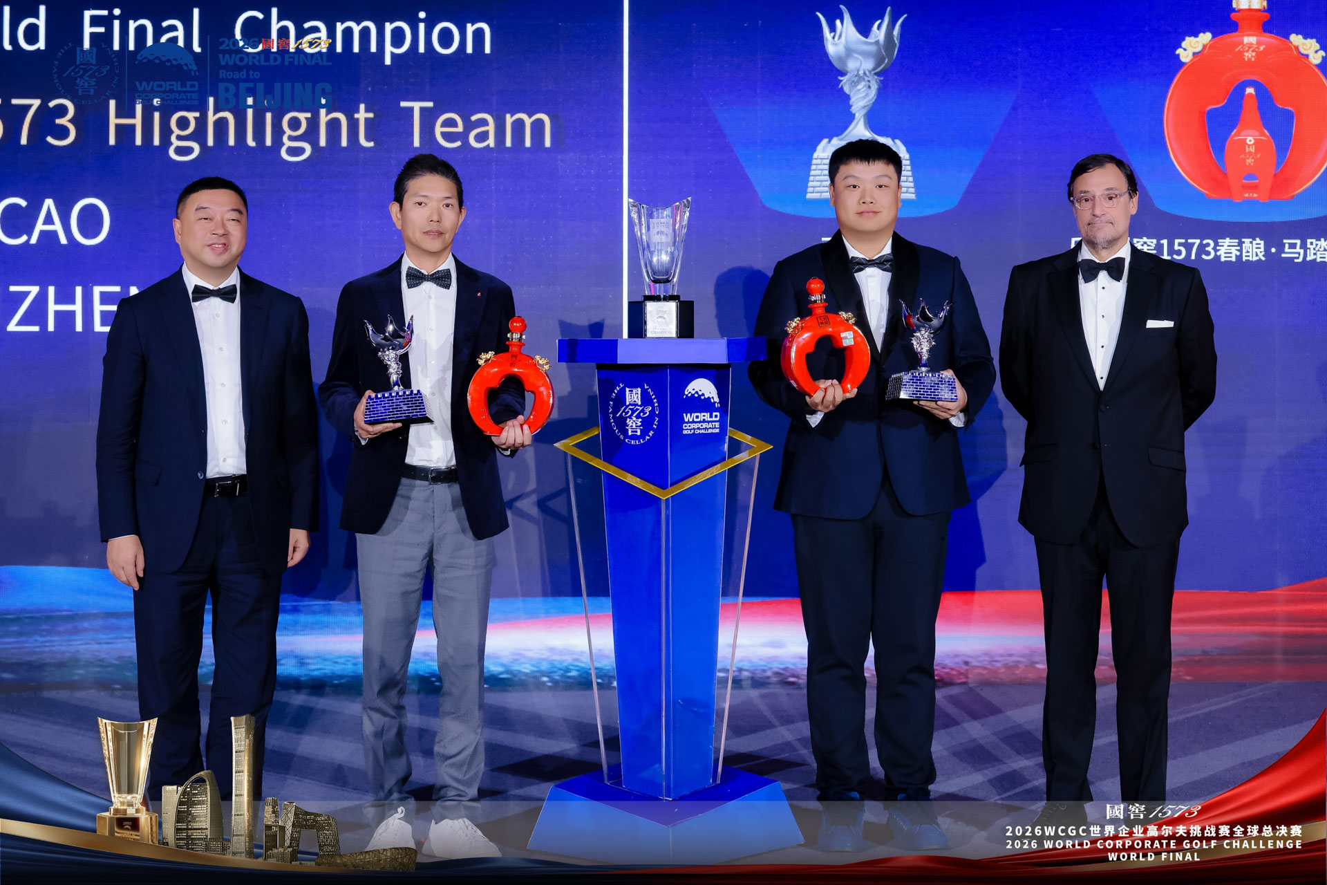 Guojiao 1573 Highlight Team receive the 2026 WCGC World Final champions trophy at the Prize Giving Gala Dinner in Beijing