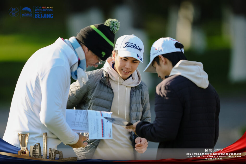 Players check their scorecard during Round 2 of the 2026 WCGC World Final