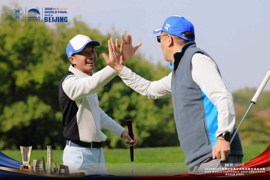 Players high-five on the course during the Sports Legends Cup 2026
