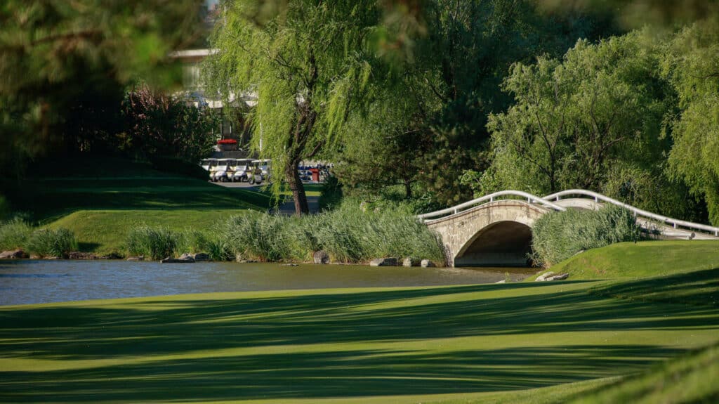 Stone bridge over a water hazard on the golf course